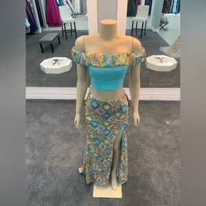 Size 6. aqua color. 2piece fully sequined. trumpet. corset back off the shoulder